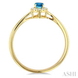5x3 MM Oval Shape Blue Topaz and 1/20 Ctw Single Cut Diamond Halo Semi-Precious Ring in 10K Yellow Gold