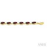 6X4 MM Oval Cut Garnet and 1/6 Ctw Round Cut Diamond Semi-Precious Tennis Bracelet in 10K Yellow Gold