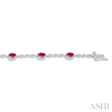 5x3 MM Oval Cut Ruby and 1/20 Ctw Single Cut Diamond Bracelet in 14K White Gold