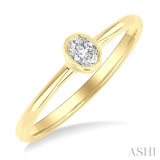 1/6 Ctw Petite Bezel Set Oval Cut Diamond Fashion Ring in 10K Yellow Gold