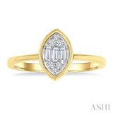 1/6 Ctw Petite Bezel Set Marquise Shape Fusion Baguette and Round Cut Diamond Fashion Ring in 10K Yellow Gold