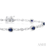 4X3 MM Pear Cut Sapphire and 1/20 Ctw Round Cut Diamond Precious Fashion Bracelet in 10K White Gold